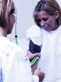 A person having their blood pressure taken